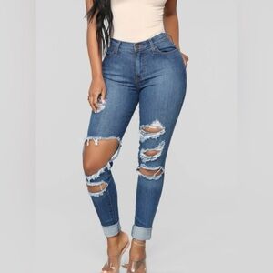 Mid Rise Distressed Skinny Jeans
